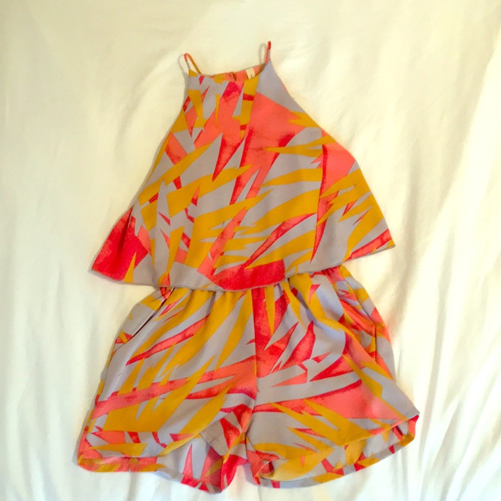 Bright, fun romper! Never worn with tag.